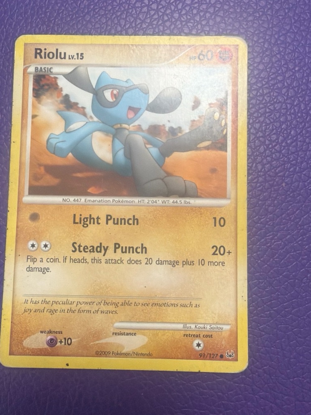 Pokemon Riolu Trading Card - Blue, Yellow, Brown